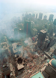 U.S. Customhouse is seen in the lower left corner of this photo showing the devastation of the attack on the WTC in New York Sept. 11.