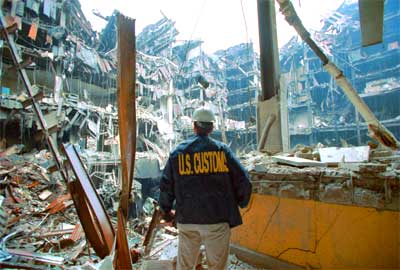 A U.S. Customs Agent surveys the damage inside the Customhouse in NYC following the Sept. 11 terrorist attack.
