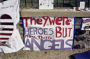 Hand made poster: "They Were Heroes But Now They're Angels." 