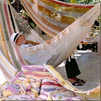 José Gonzalez reclining in one of his hammocks