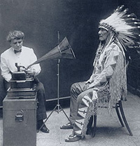 Frances Densmore plays a recording for the Chief of the Blackfoot tribe
