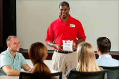 Red Cross instructor teaching a class