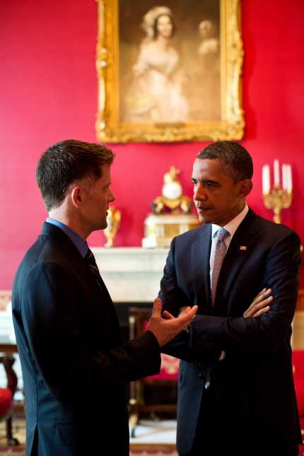 President Barack Obama talks with Grant Colfax, Director of the Office of National AIDS Policy (July 26, 2012)