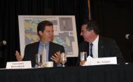 Governor Sam Brownback talks with Dr. Kirk Schulz, President of Kansas State University at a Field Hearing in Wichita, Kansas in August 2011