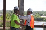 Grassley talks with a construction worker at the Cedar Rapids Court House