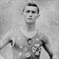 Ehrich Weiss wearing track team medals, 1890