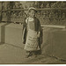 Freddie Kafer, a very immature little newsie selling Saturday Evening Posts and newspapers at the entrance to the State Capitol.... Sacramento, California (LOC)