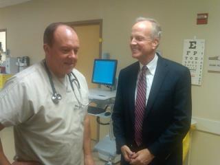 Photo: Visiting with Dr. Ben Short, emergency room physician at Western Plains Medical Complex.