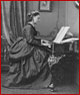 Image of a woman reading music