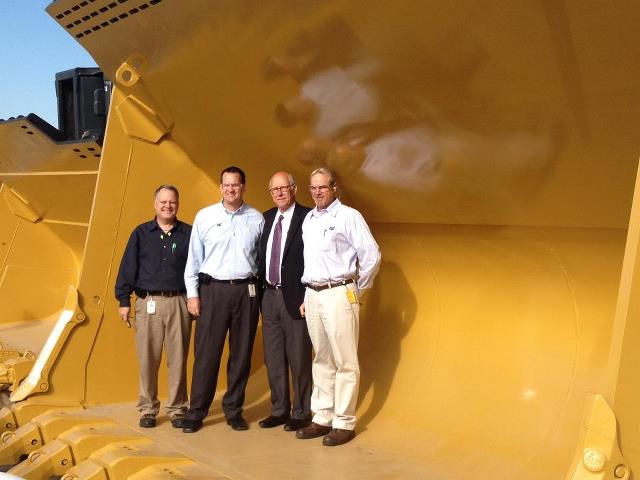Photo: Thank you to the 500 employees at Caterpillar in Wamego for a tour of their busy manufacturing facility. I'm standing in a Caterpillar loader bucket used to mine one of the world's primary energy sources - coal.