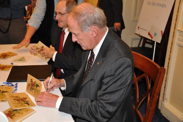 Senator Coats Signs Holiday Cards for Troops