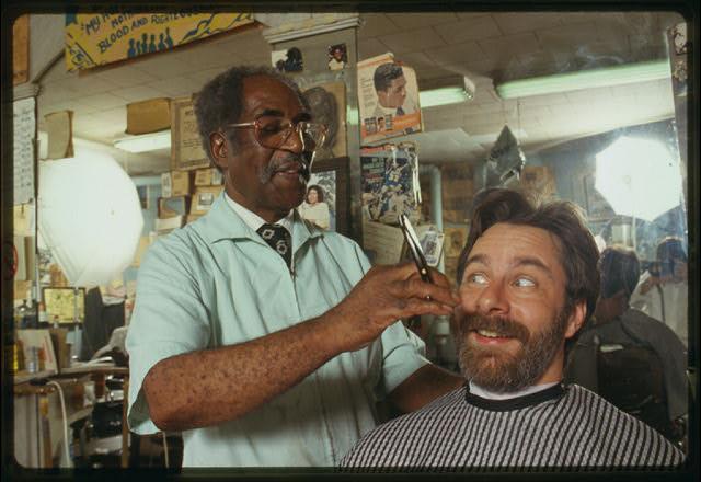 Photo: Will he or won't he?  In honor of "No Beard Day," just one of the wacky holidays celebrated on October 18, here is a photo of Louis McDowell preparing to give AFC fieldworker David Taylor a shave during our Working in Paterson fieldwork project in 1994.  Strangely, Taylor still has a beard to this day.

October 18 is also Chocolate Cupcake Day.  Enjoy!