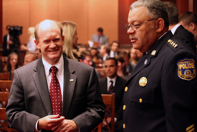 Senator Coons speaks with Law Enforcement Officials