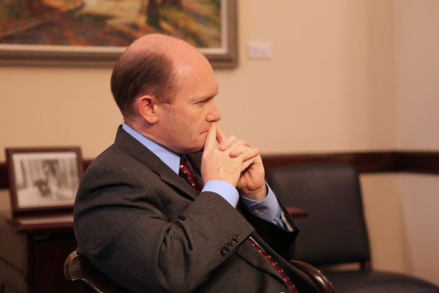 Senator Coons listens to a question during a live online chat with teachers