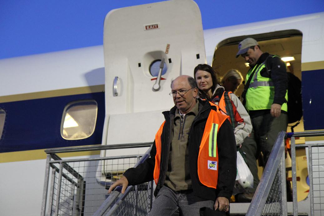 The ambassador and Ms. Jinnette exiting the DC-8 after another successful IceBridge survey flight.