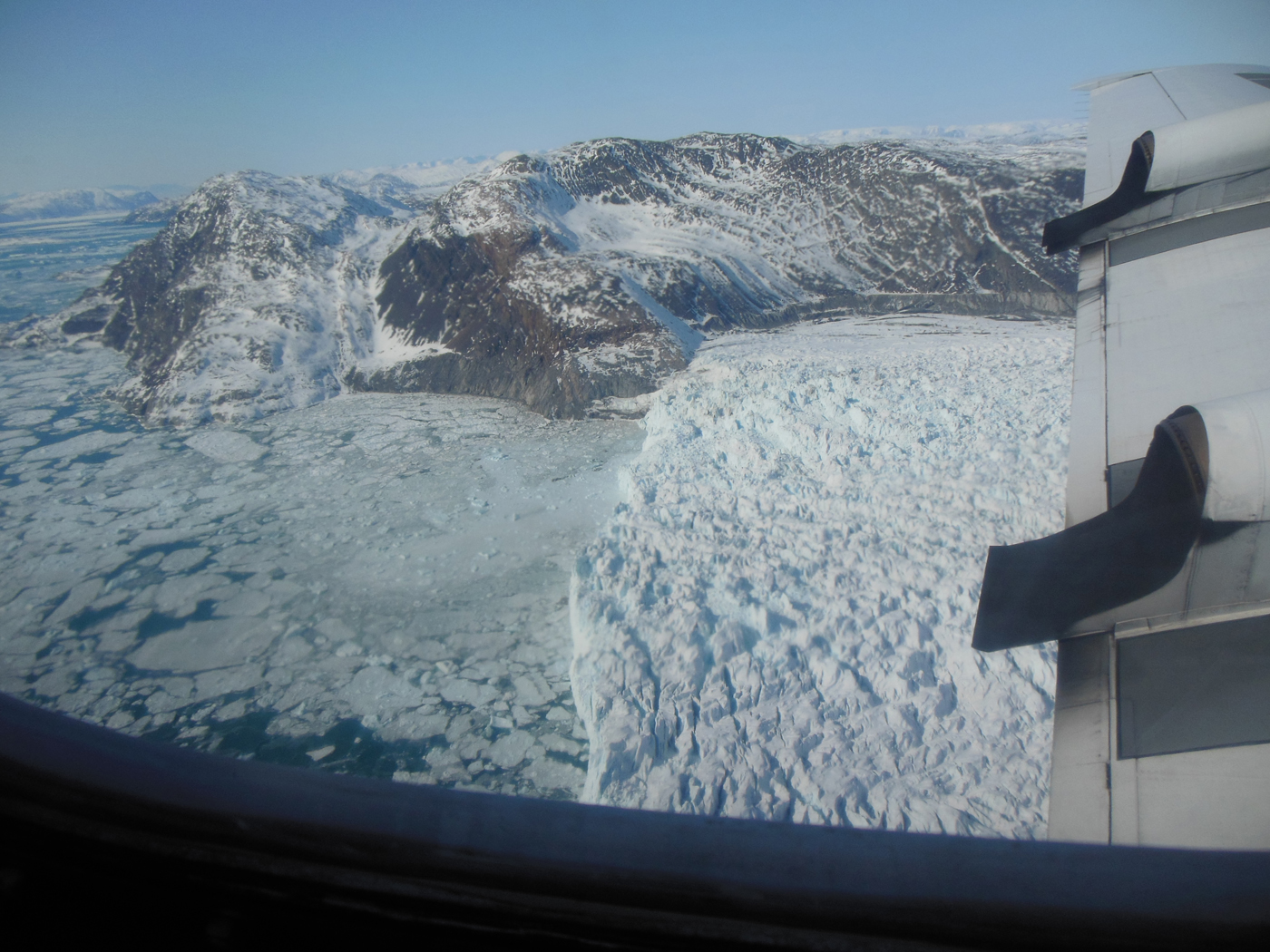 An image of a glacier’s calving front, where it flows and loses ice to the sea.
