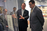 Mayor Gray and Public Printer Bill Boarman view an original printed copy of the preliminary version of the Emancipation Proclamation that GPO printed in 1862. The document is on display at GPO's 150th anniversary history exhibit.