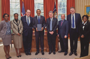Image: Public Printer Bill Boarman, Archivist David Ferriero, Director of the Office of the Federal Register Ray Mosley, GPO�s Chief of Staff Davita Vance-Cooks and OFR staff present President Barack Obama the first volume of his Public Papers of the President at The White House.