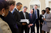 Image: Public Printer Bill Boarman, Archivist David Ferriero, Director of the Office of the Federal Register Ray Mosley, GPO’s Chief of Staff Davita Vance-Cooks and OFR staff present President Barack Obama the first volume of his Public Papers of the President at The White House