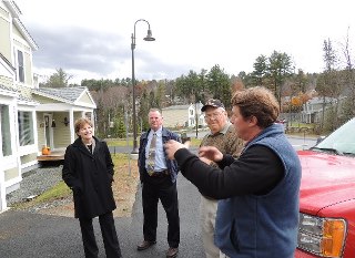 Photo: Senator Shaheen toured the recently completed Town and Country Family Housing Project in Littleton. Shaheen visited apartments in the development and met with the tenants that live there. The development is operated by AHEAD (Affordable Housing, Education and Development) a community-based housing organization that offers affordable housing to families in northern New Hampshire. From left to right are Senator Shaheen, former AHEAD Executive Director David Wood, resident Ralph Doolan and Ben Armsden, President of the AHEAD Board of Directors. (October 19, 2012. Littleton, NH)