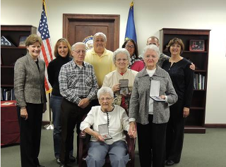 Photo: Senator Shaheen helped honor Veterans Day with a military medals ceremony to posthumously recognize World War II Veteran Henry Proulx. Proulx enlisted in the United States Army at the age of 23 and was stationed in North Africa and Italy. Pictured is his family, who live in Hooksett. (November 9, 2012. Manchester, NH.)