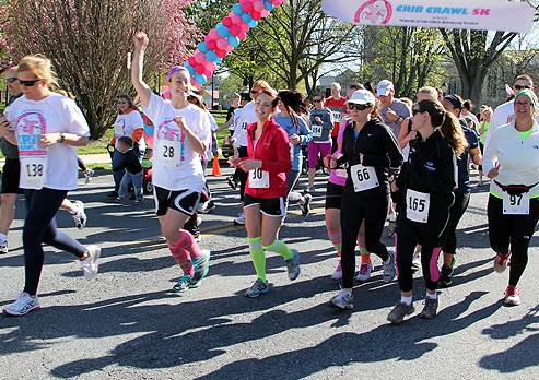 Runners start the Frederick County, MD, Crib Crawl 5K on April 7, 2012.