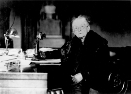 Senator Rebecca Felton sits at her Senate desk.