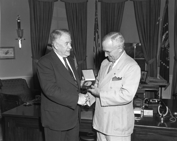 Picture of Alben Barkley receiving Congressional Gold Medal from Harry Truman