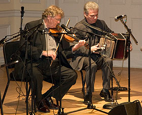 Brendan Mulvihill plays fiddle with Billy McComiskey on the accordion
