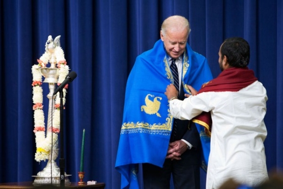 Vice President Joe Biden is presented with a shawl 