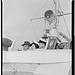 [Portrait of Cliff Edwards, Betty Brewer, and Frank Raye, Ukelele Lady (yacht), Hudson River, N.Y., ca. June 1947] (LOC)