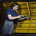 Operating a hand drill at Vultee-Nashville, woman is working on a "Vengeance" dive bomber, Tennessee (LOC)