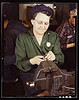 War production worker at the Vilter [Manufacturing] Company making M5 and M7 guns for the U.S. Army, Milwaukee, Wis. Ex-housewife, age 49, now doing bench work on small gun parts. Son [is] Second L[ieutenan]t, Son-in-law, Capt[ain] in Army (LOC) by The Library of Congress