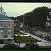 An American town and its way of life, Southington, Conn. The Memorial Day parade moving down the main street. The small number of spectators is accounted for by the fact that the town's war factories did not close. The town hall is in the left foreground.