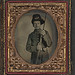 [Unidentified soldier in Union uniform and plumed infantry Hardee hat with bayoneted musket and cap box] (LOC)