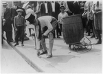 Measuring F Street in the National Capitol during the rush hours of the afternoon with a one foot rule, was the initiation stunt wished on this applicant for membership in a local college fraternity