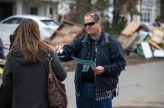 Photo: 20121110-N-RA981-088

(Nov. 10 2012) Travel Security Administration representative, U.S. Air Marshall Troy Coleman informs Hurricane Sandy survivors, Long Beach, N.Y. residents Barbara Bloom and Rona Wohlgemuth of how to take advantage of FEMA's services. FEMA, Border Patrol, TSA and ICE visited homes to inform residents of FEMA services as part of the Federal Surge Crisis Response. (Photo by Mass Communication Specialist 3rd Class Patrick Ratcliff/Released) Digital