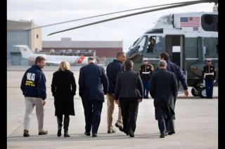 Photo: President Barack Obama prepares to board Marine One for an aerial tour of Hurricane Sandy storm damage, following his arrival at John F. Kennedy International Airport in New York, N.Y., Nov. 15, 2012. Accompanying the President, from left, are: Secretary of Housing and Urban Development Shaun Donovan; Sen. Kirsten Gillibrand, D-N.Y.,; Sen. Chuck Schumer, D-N.Y.,; Secretary of Homeland Security Janet Napolitano; New York Mayor Michael Bloomberg; and New York Governor Andrew Cuomo. (Official White House Photo by Sonya N. Hebert) http://wh.gov/sandy