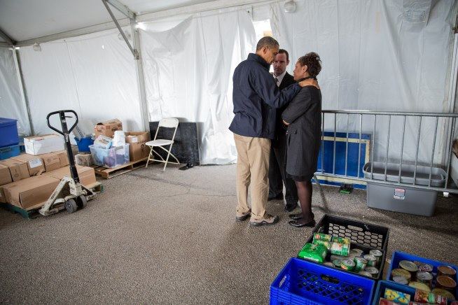 Photo: Photo from The White House: President Barack Obama meets privately with Damien and Glenda Moore at a FEMA Disaster Recovery Center tent in Staten Island, N.Y., Nov. 15, 2012. The Moore’s two small children, Brandon and Connor, died after being swept away during Hurricane Sandy. (Official White House Photo by Pete Souza)