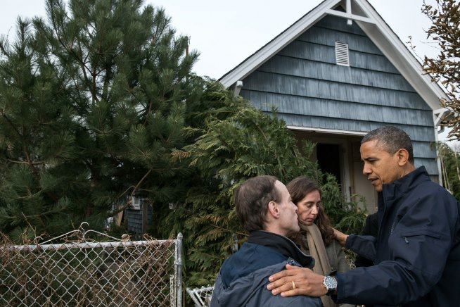 Photo: President Barack Obama talks with residents on Cedar Grove Avenue during a walking tour of Hurricane Sandy storm damage in Staten Island, N.Y., Nov. 15, 2012. (Official White House Photo by Pete Souza) http://wh.gov/sandy