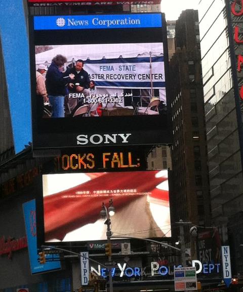 Photo: FEMA is spreading the word in multiple languages about registering for disaster assistance in New York's Times Square.