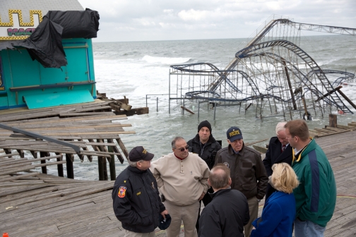 Vice President Joe Biden is led on a tour by Mayor William Akers of the damaged boardwalk