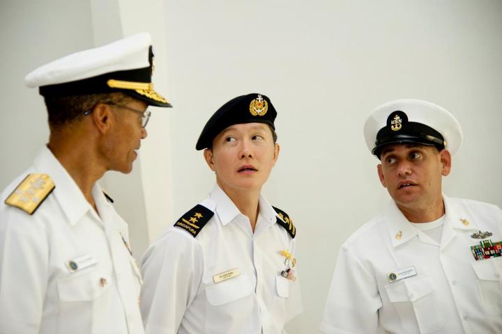 Photo: PEARL HARBOR (Nov. 5, 2012)  Adm. Cecil Haney, commander of the U.S. Pacific Fleet; Chief the Republic of Singapore Navy Rear Adm. Ng Chee Peng; and Senior Chief Boatswain's Mate Alex Rincones, discuss history during a visit to the USS Arizona Memorial. Haney hosted Ng to a tour of history Pearl Harbor sites during his visit to Hawaii. (U.S. Navy photo by Mass Communication Specialist 1st Class Shawn Gentile)