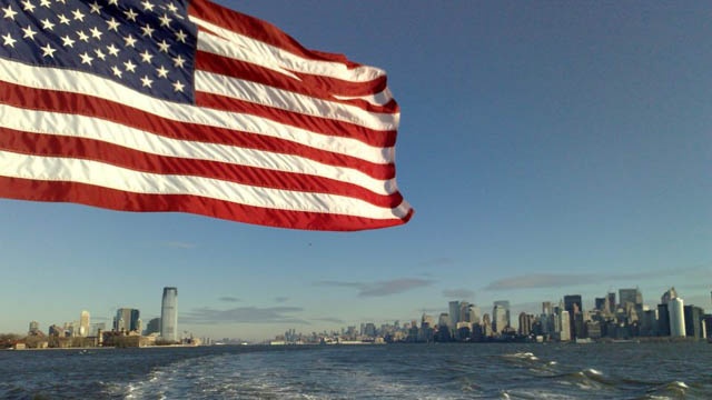 USA Flag flaying on ship in New York Harbor