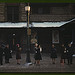 Commuters, who have just come off the train, waiting for the bus to go home, Lowell, Mass. (LOC)