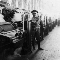 Boy sweeper working in a cotton mill in Evansville, Indiana