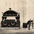 A drawing of Lincoln's funeral car led by horses.