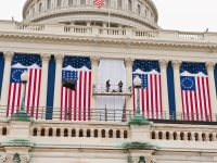 AOC employees hang flags and bunting in preparation for the 2009 Inaugural