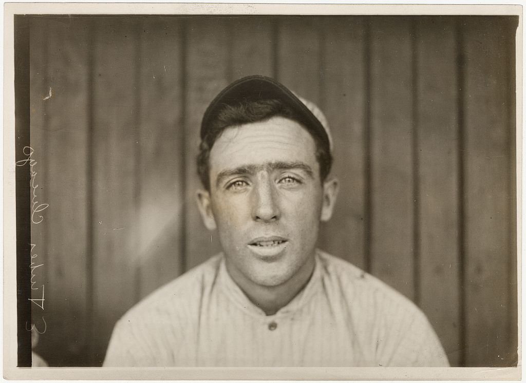 Photograph shows Joe Tinker, shortstop for the Chicago Cubs, head-and-shoulders portrait, facing front.