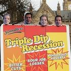 Unison protesters wearing George Osborne masks and with a giant 'triple dip recession' sign at College Green, central London